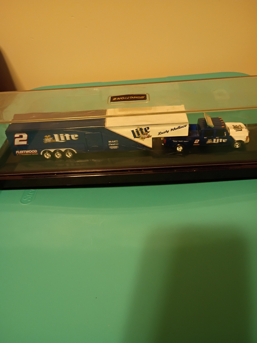 Lite-Branded Blue and White Transporter Truck Collectible